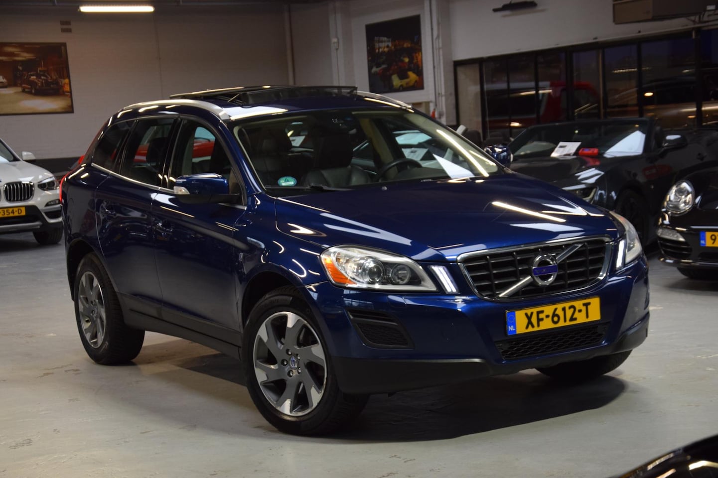 Volvo XC60 - 2.4 D5 AWD *Ocean Race* Aut|Navi|Leder|Panoramadak|215pk! - AutoWereld.nl