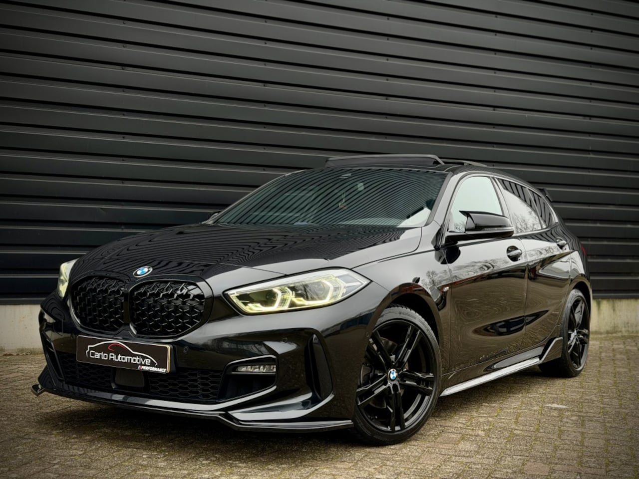 BMW 1-serie - 118i M-PERF. M135 PANO|SCHAALSTOEL|CAMERA - AutoWereld.nl