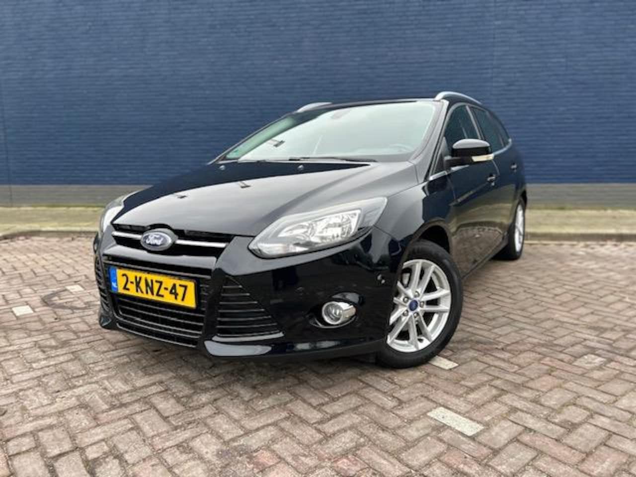 Ford Focus Wagon - 1.0 EcoBoost Titanium NW DISTI, Keyless, Airco, Cruise - AutoWereld.nl