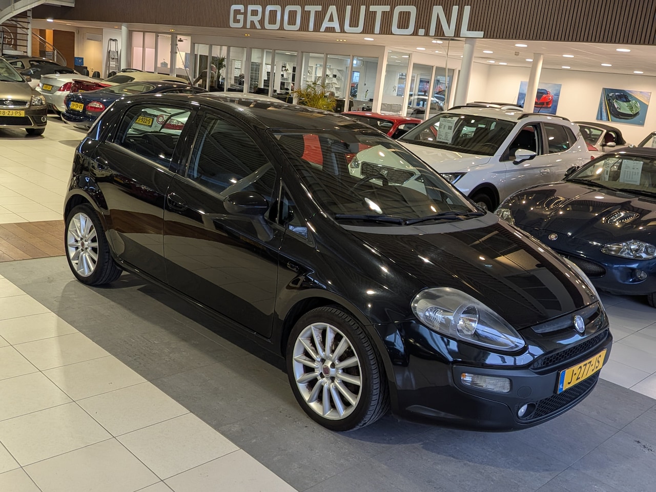 Fiat Punto Evo - 1.4-16V Multiair Racing Airco, Stuurbekrachtiging - AutoWereld.nl
