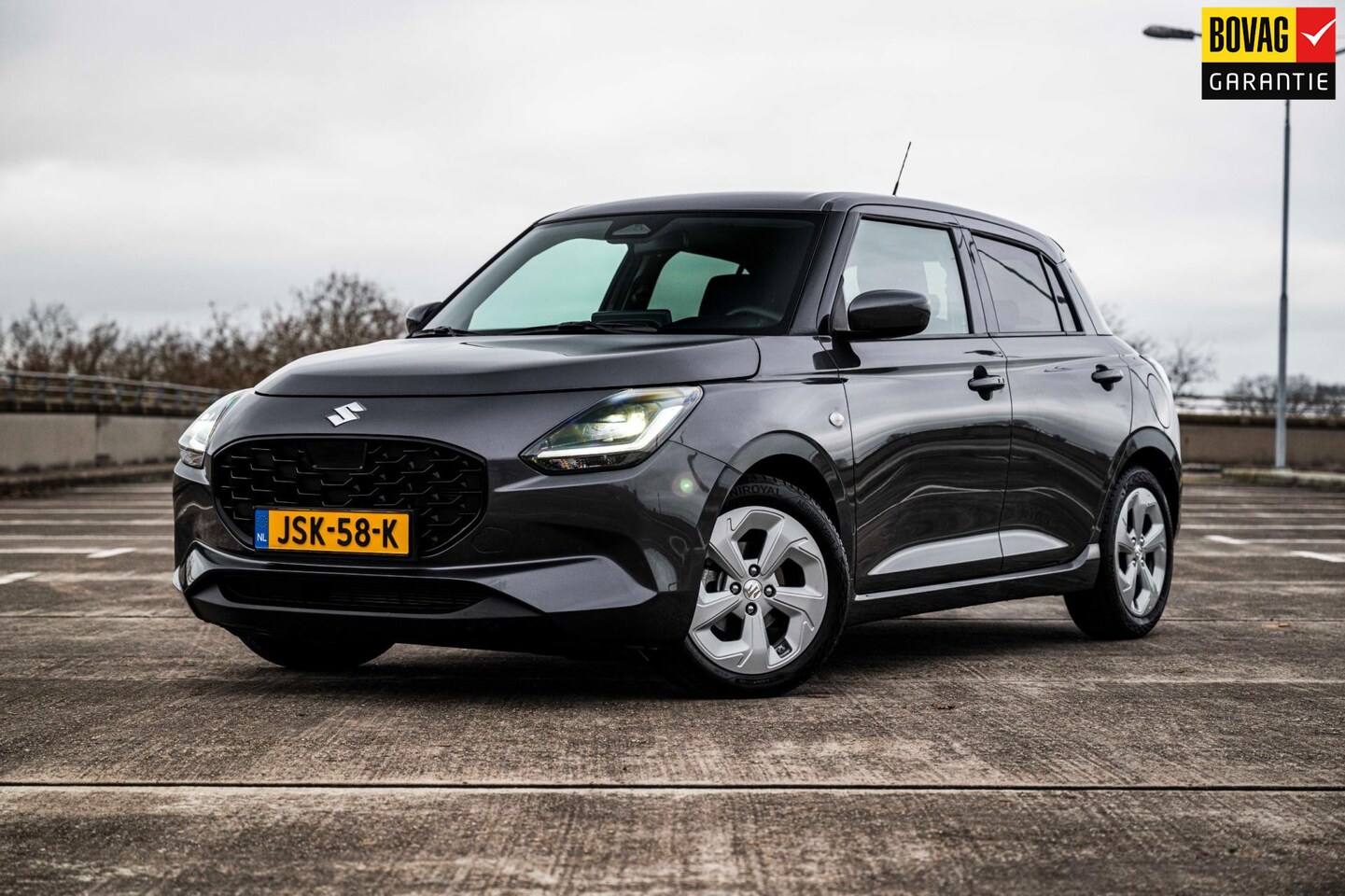 Suzuki Swift - 1.2 Select Smart Hybrid | Automaat | Airco | Adaptieve Cruise Control | Camera | Navigatie - AutoWereld.nl