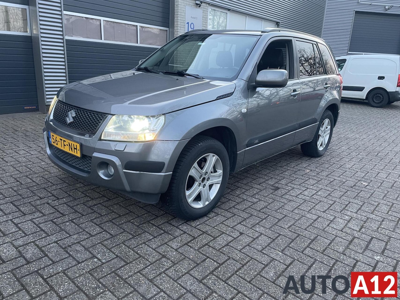 Suzuki Grand Vitara - 2.0-16V JLX AUTOMAAT Full optie - AutoWereld.nl