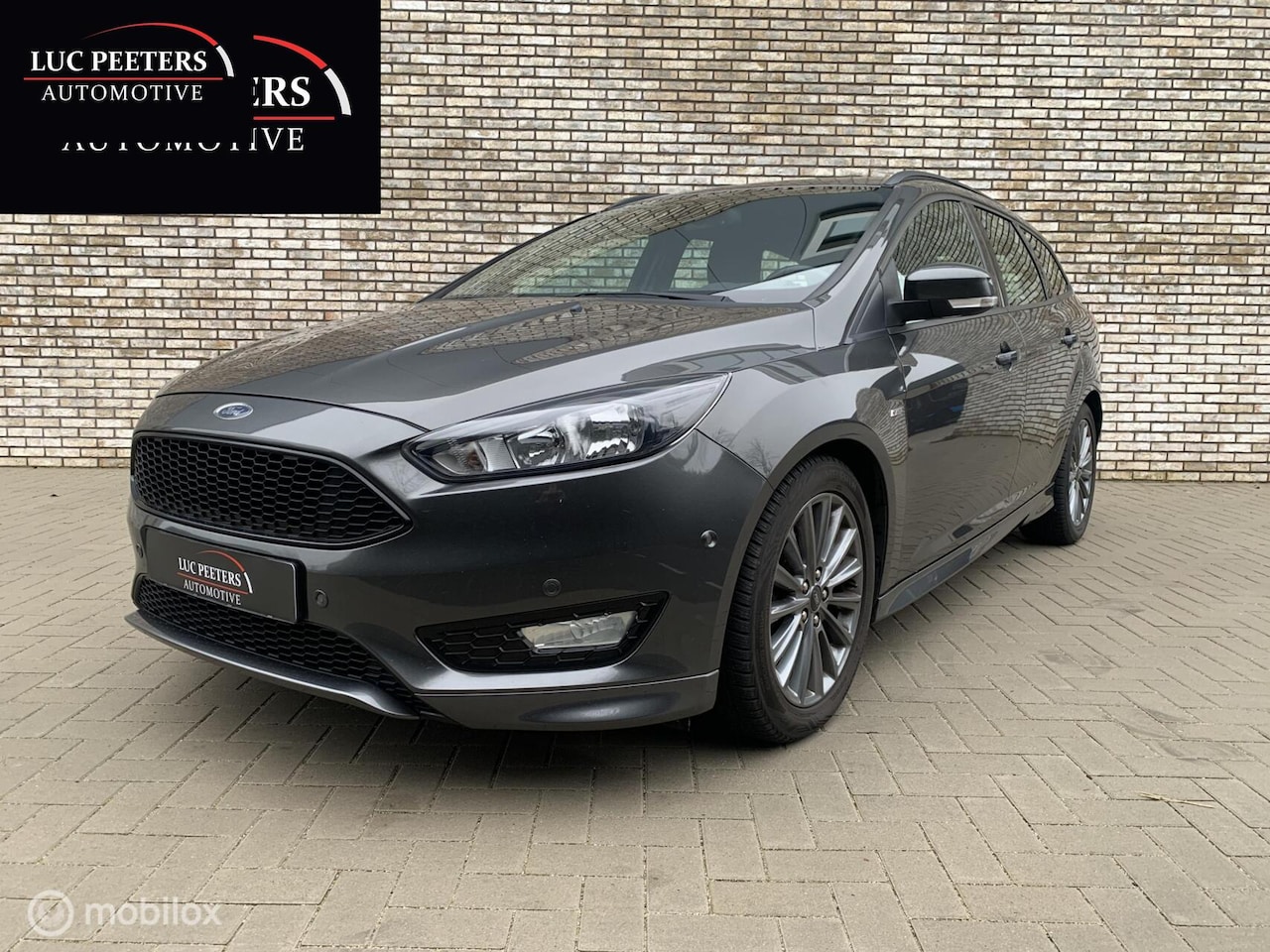 Ford Focus Wagon - 1.0 ST-Line/NAP/2EIG/DEALEROH/NAVI - AutoWereld.nl