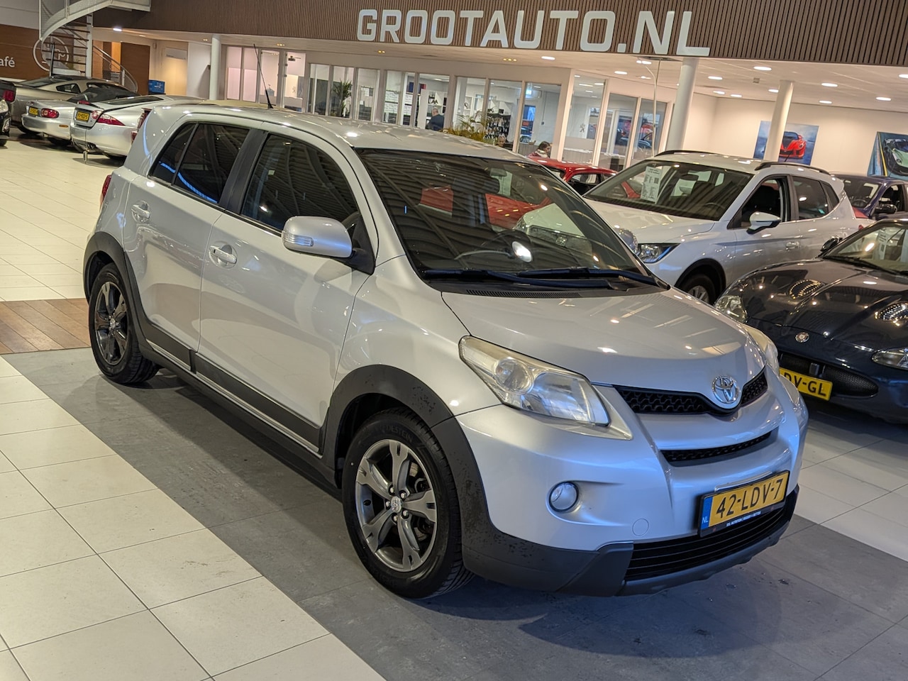 Toyota Urban Cruiser - 1.3 VVT-i Dynamic Airco, Stuurbekrachtiging - AutoWereld.nl