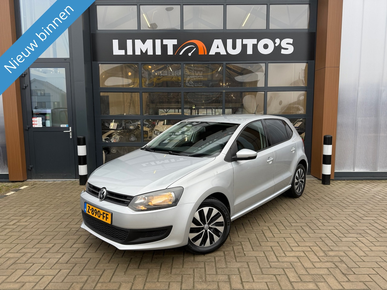 Volkswagen Polo - 1.2 Easyline Climate/Cruise/Navi/Pdc/Lmv/Apk - AutoWereld.nl