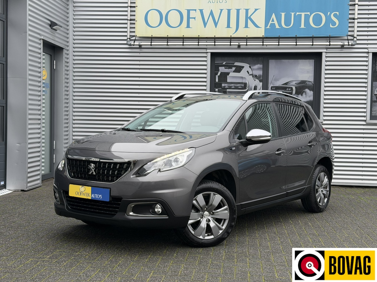 Peugeot 2008 - 1.2 PureTech Style Clima Navi CarPlay - AutoWereld.nl