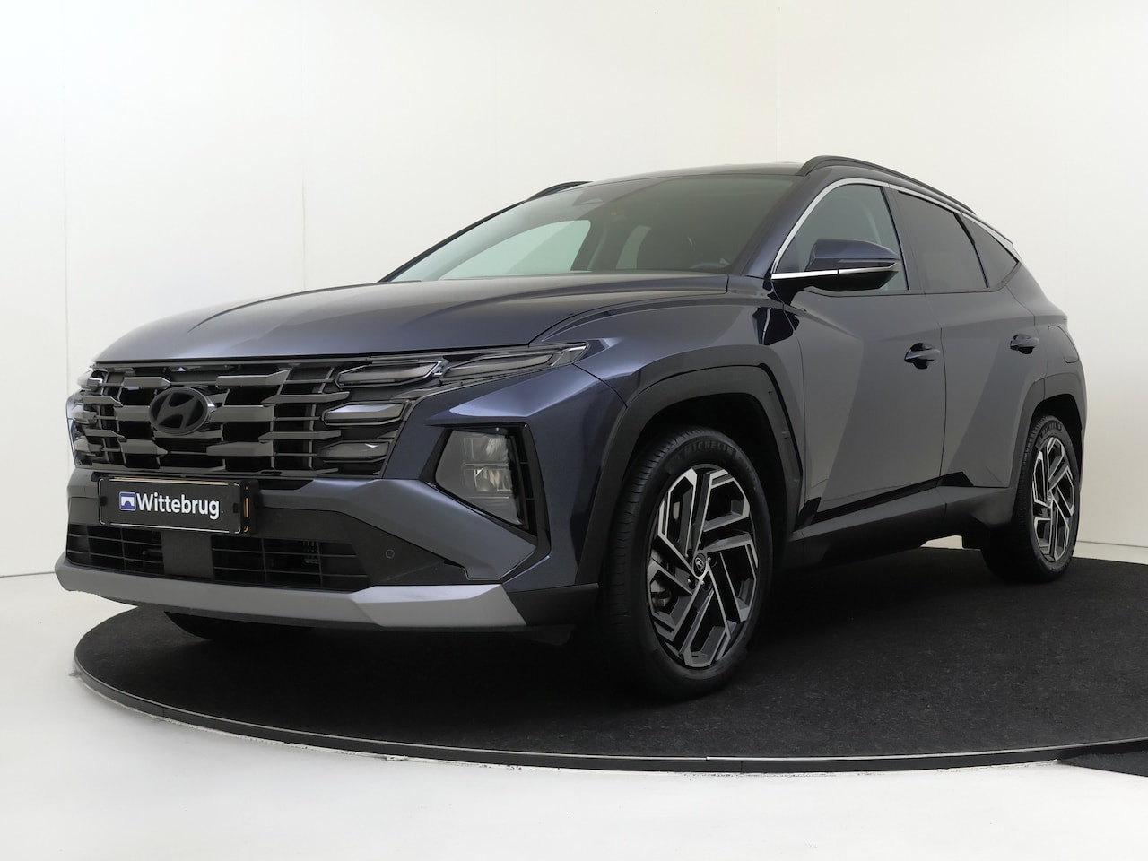 Hyundai Tucson - 1.6 T-GDI PHEV Comfort Smart STOEL- EN STUURVERWARMING | ELEKTRISCHE ACHTERKLEP | NAVIGATI - AutoWereld.nl