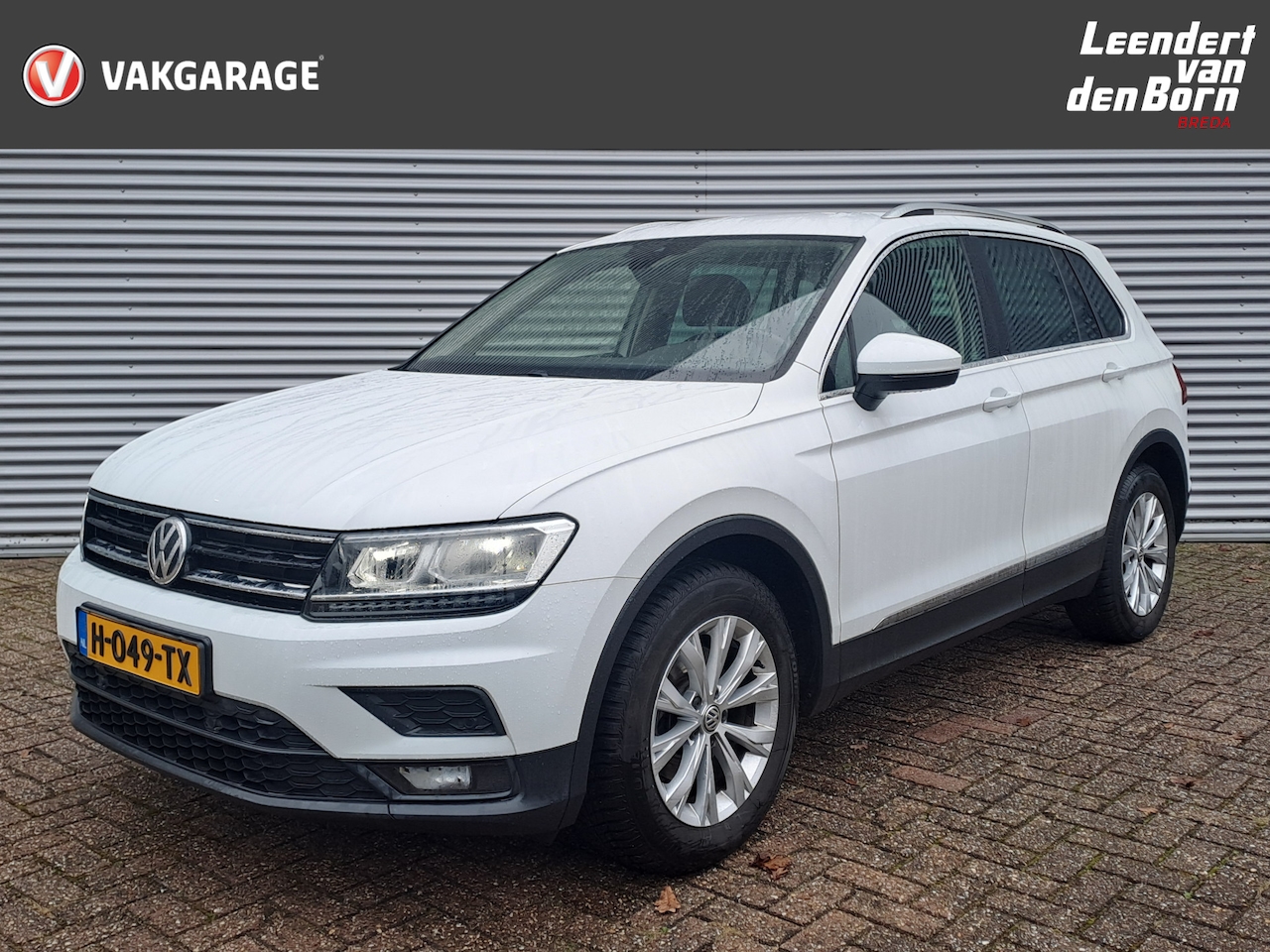 Volkswagen Tiguan - 1.5 TSI Comfortline Business | Navi | PDC | Elektrische Achterplep | Verw. Voorstoelen - AutoWereld.nl