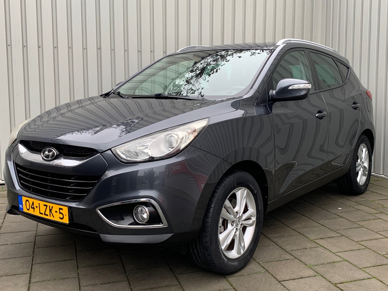 Hyundai ix35 - 2.0i Business Edition|Navigatie|149000KM|Climate Control| - AutoWereld.nl