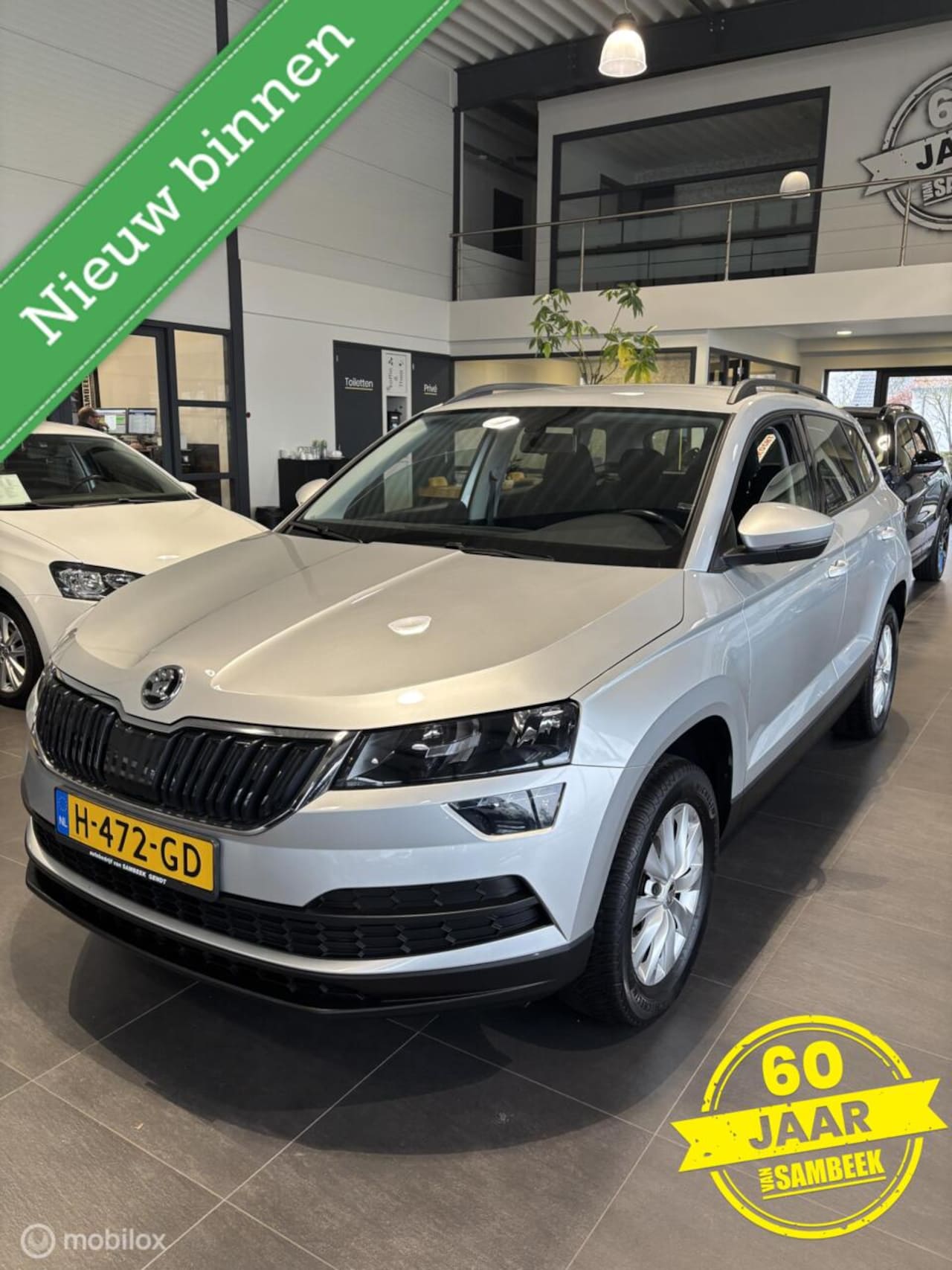 Skoda Karoq - 1.0 TSI Ambition- AIRCO-CARPLAY-ELEK. TREKHAAK - AutoWereld.nl