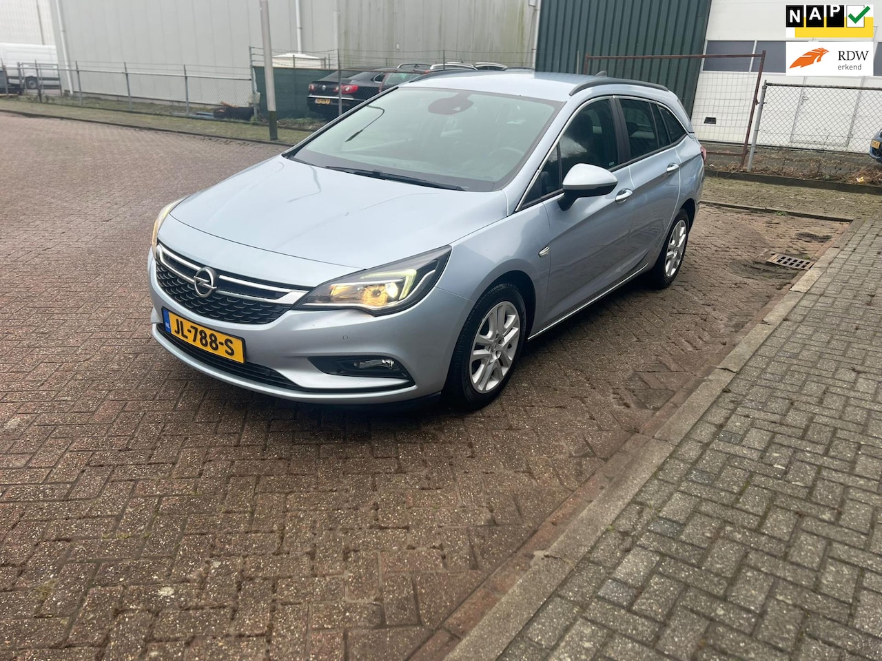 Opel Astra Sports Tourer - 1.6 CDTI Business+ Navi Airco Cruise Trekhaak Nap Pdc Voor En Achter 1e Eigenaar - AutoWereld.nl