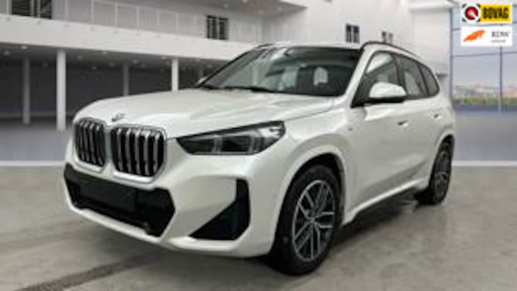 BMW X1 - SDrive18i M-Sport | Navi| Camera| Electrische achterklep| Zeer complete auto - AutoWereld.nl