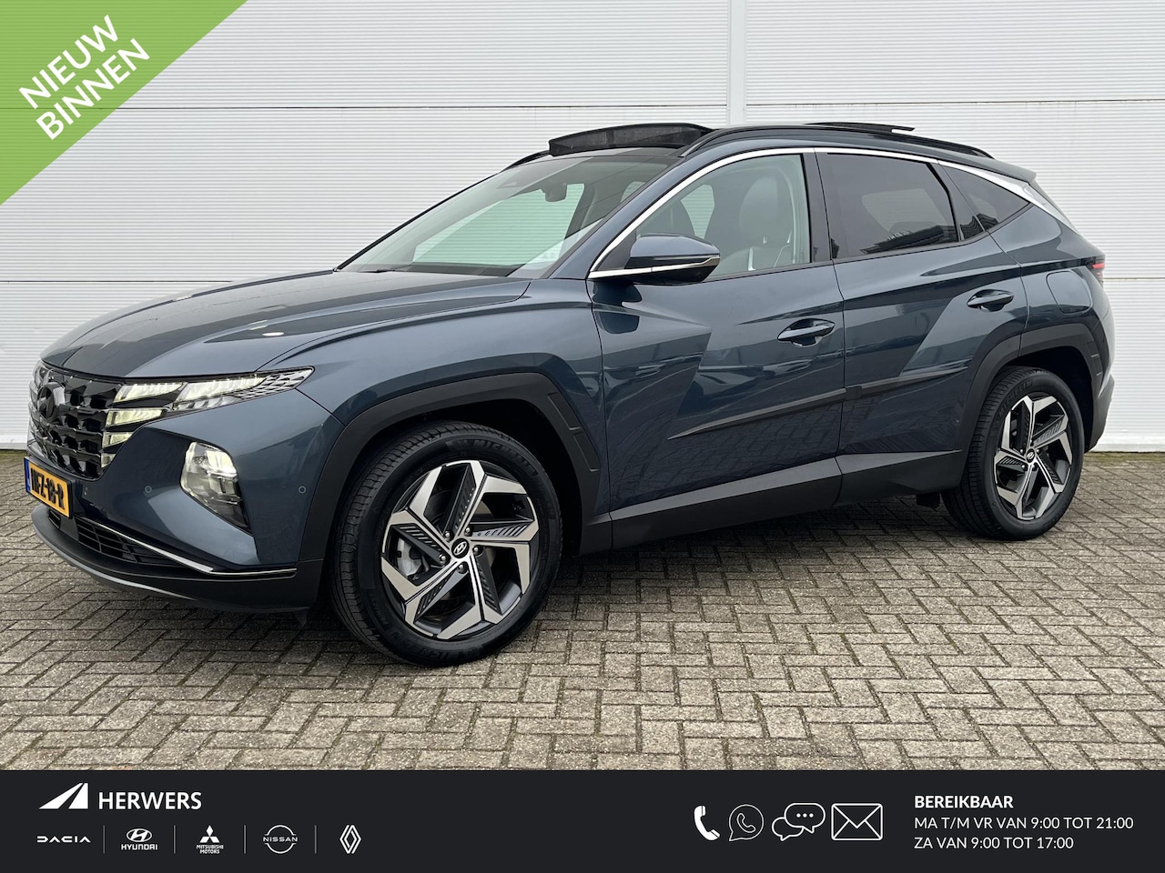Hyundai Tucson - 1.6 T-GDI HEV Premium Sky / Achterbank verwarmd / Airco (automatisch) / Cruise control ada - AutoWereld.nl
