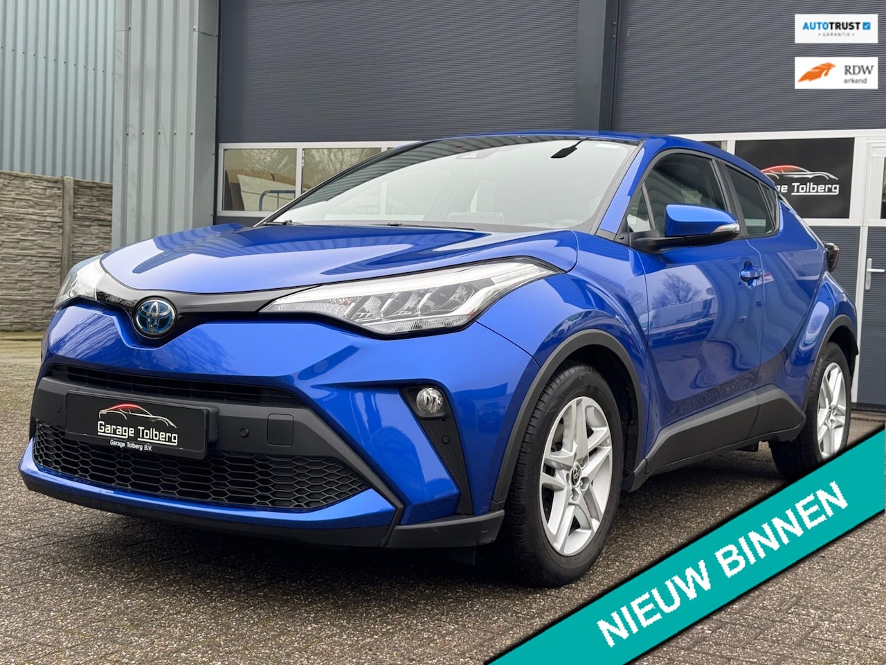 Toyota C-HR - 1.8 Hybrid Business Plus 2022 in stijlvolle blauwe kleur! Luxe lederen bekleding, slechts - AutoWereld.nl