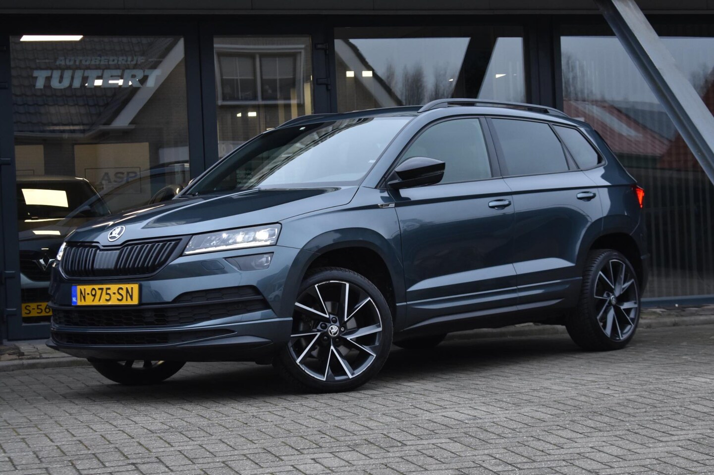 Skoda Karoq - 1.5 TSI ACT Sportline | TREKHAAK | VIRTUAL | CAMERA | NAP | APPLE CARPLAY | ANDROID AUTO - AutoWereld.nl
