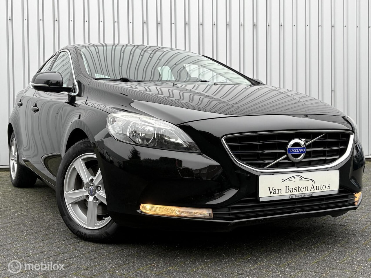 Volvo V40 - 1.6 T2 Momentum | Navi | PDC | Cruise | Bluetooth | 2014 | Volledige historie | - AutoWereld.nl