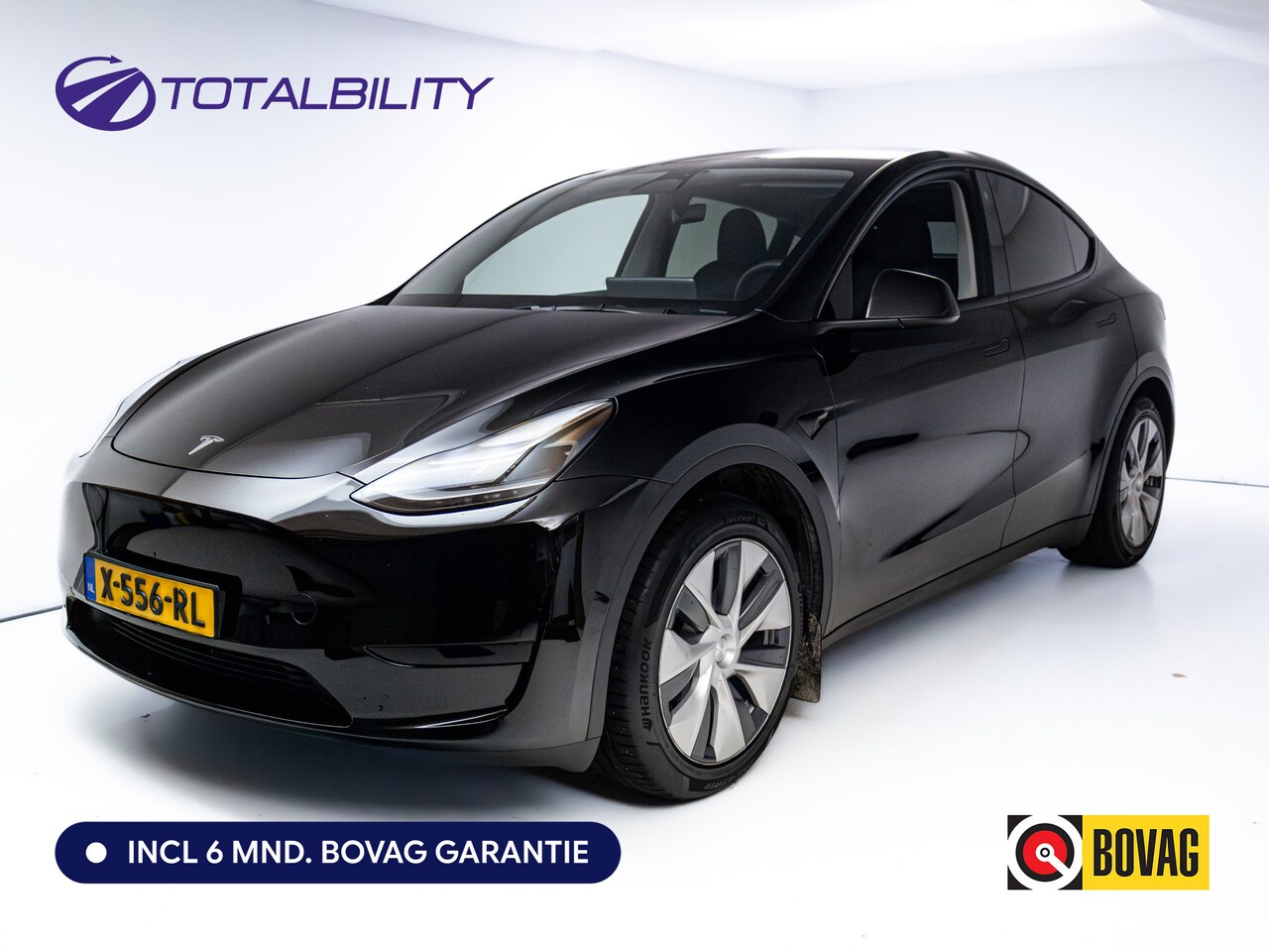 Tesla Model Y - RWD 58 kWh | Panodak | Zwart exterieur | Zwart leder | Navigatie | Extra getint glas | Cam - AutoWereld.nl