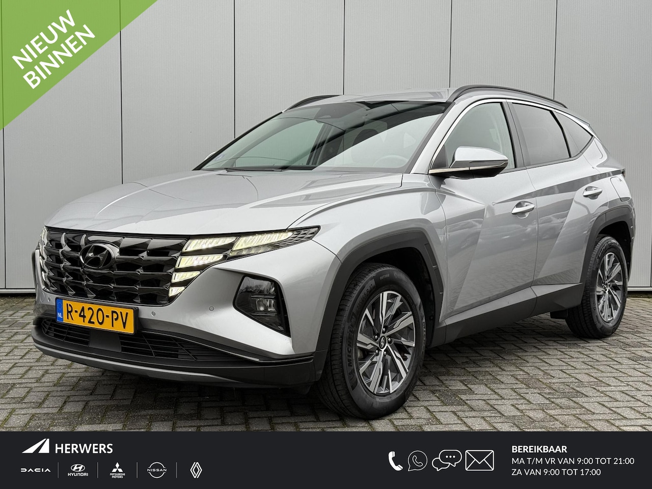 Hyundai Tucson - 1.6 T-GDI HEV Comfort Smart / Navigatie / Adaptieve Cruise Control / Fabrieksgarantie t/m - AutoWereld.nl