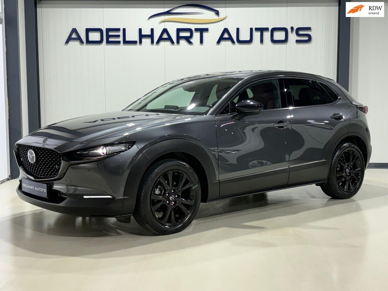 Mazda CX-30 - 2.0 e-SkyActiv-G M Hybrid Exclusive-line Automaat / Lederen interieur / Elektrische stoele - AutoWereld.nl