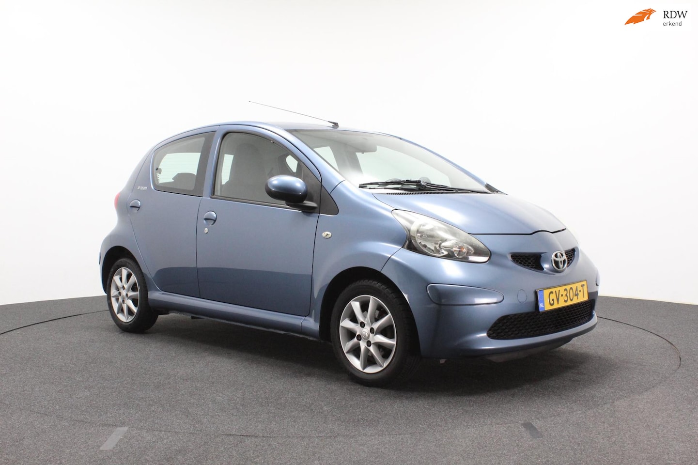 Toyota Aygo - 1.0-12V Dynamic Blue | Airco | Half leer | Sportvelgen | Elektrische ramen - AutoWereld.nl