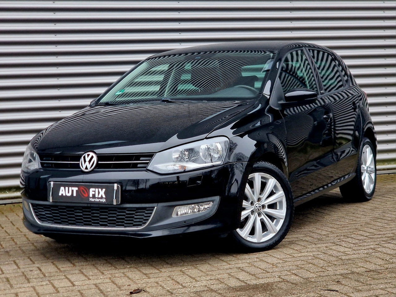 Volkswagen Polo - 1.4-16V Trendline Style / Stoelverw / PDC / 4 Season - AutoWereld.nl