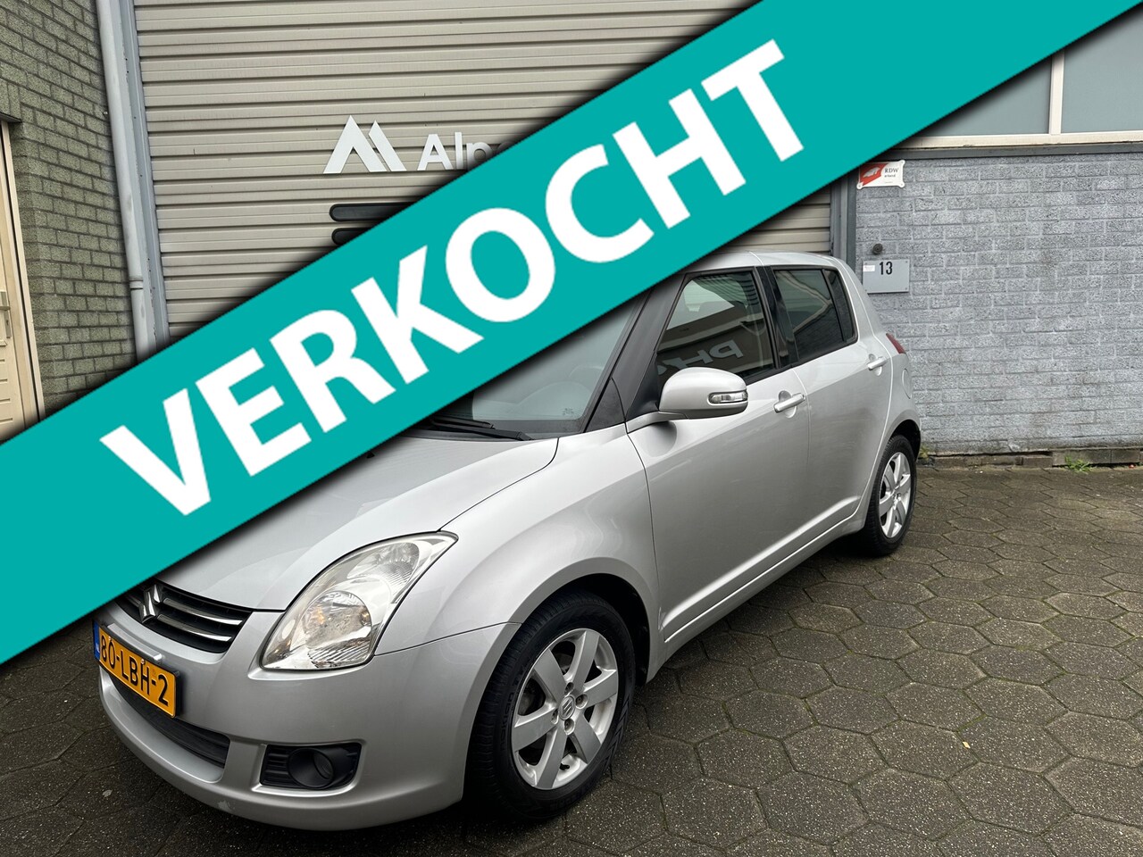 Suzuki Swift - 1.3 Limited Eerste eigenaar / Airco / stoel verwarming / NAP / APK 11-2026 - AutoWereld.nl