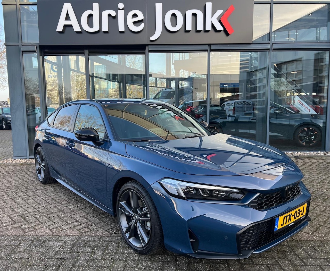 Honda Civic - 2.0 e:HEV Sport | DEMO | FULL HYBRID | 18 INCH | APPLE & ANROID AUTO | CAMERA | STUUR + ST - AutoWereld.nl
