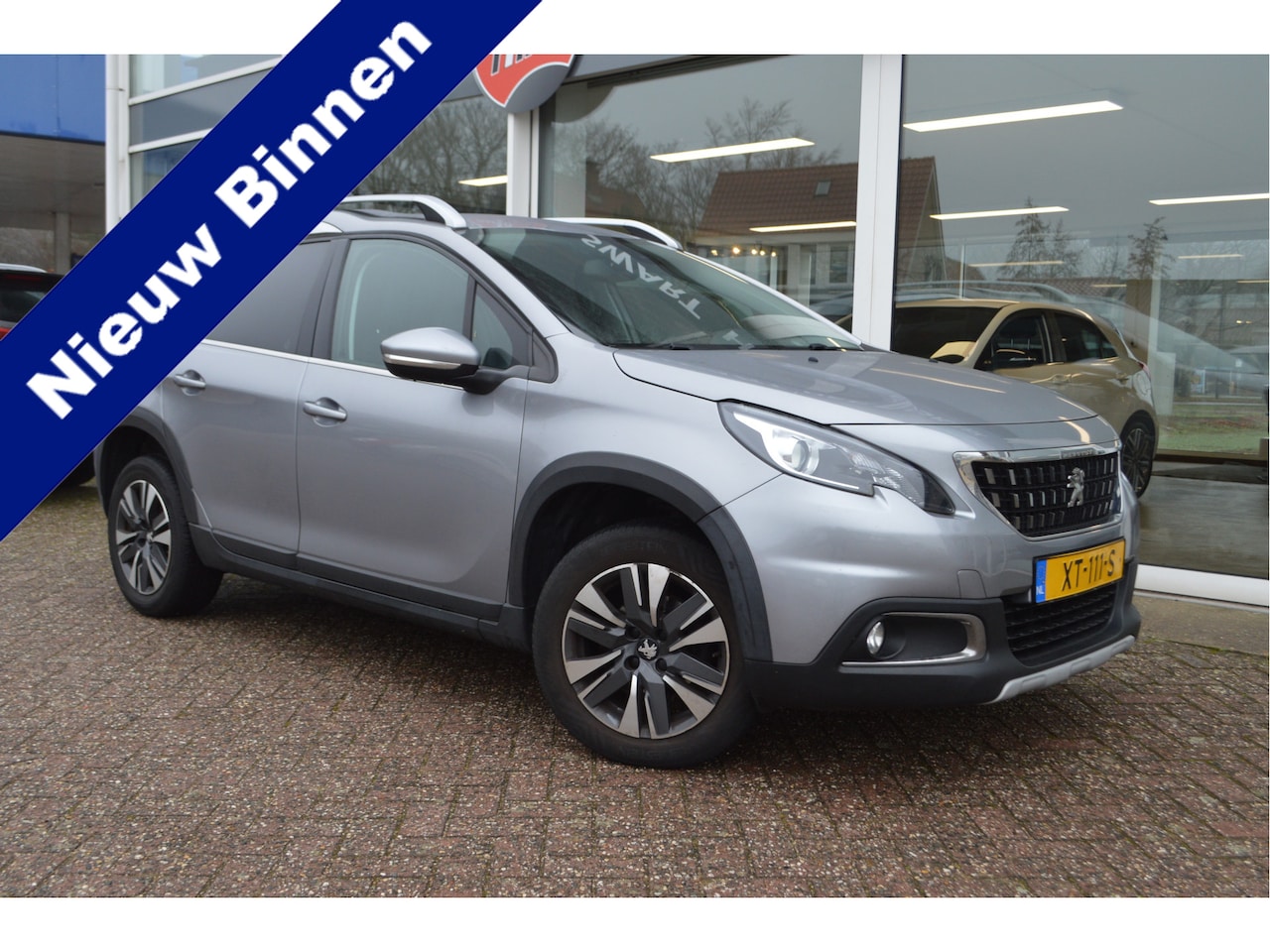 Peugeot 2008 - 1.2 PureTech Allure | Orig NL auto | Cruise C. | Navi | All Season banden - AutoWereld.nl