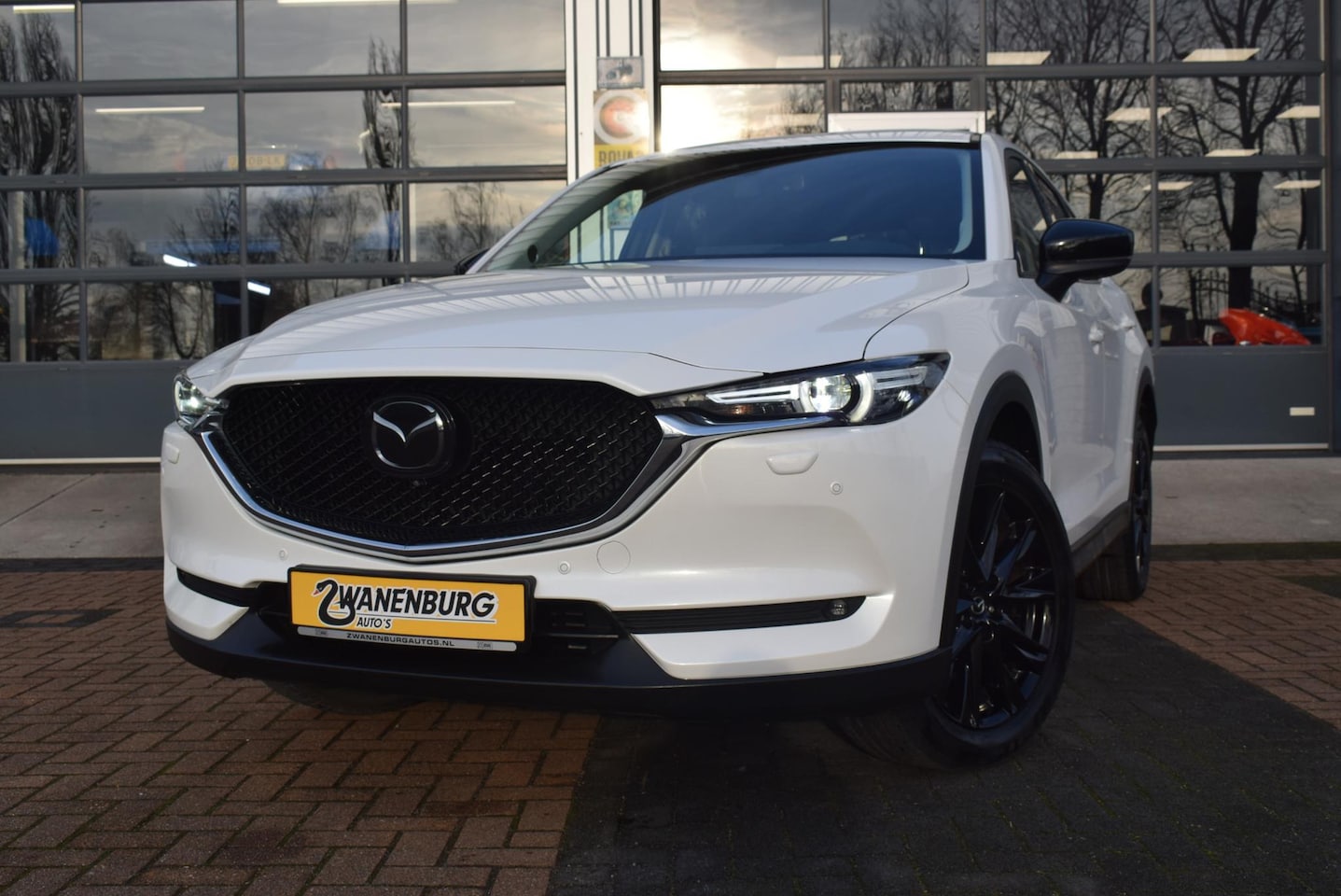 Mazda CX-5 - 2.0 SkyActiv-G 165 Homura Navi Airco Leder 10"scherm Km 99.500!! - AutoWereld.nl