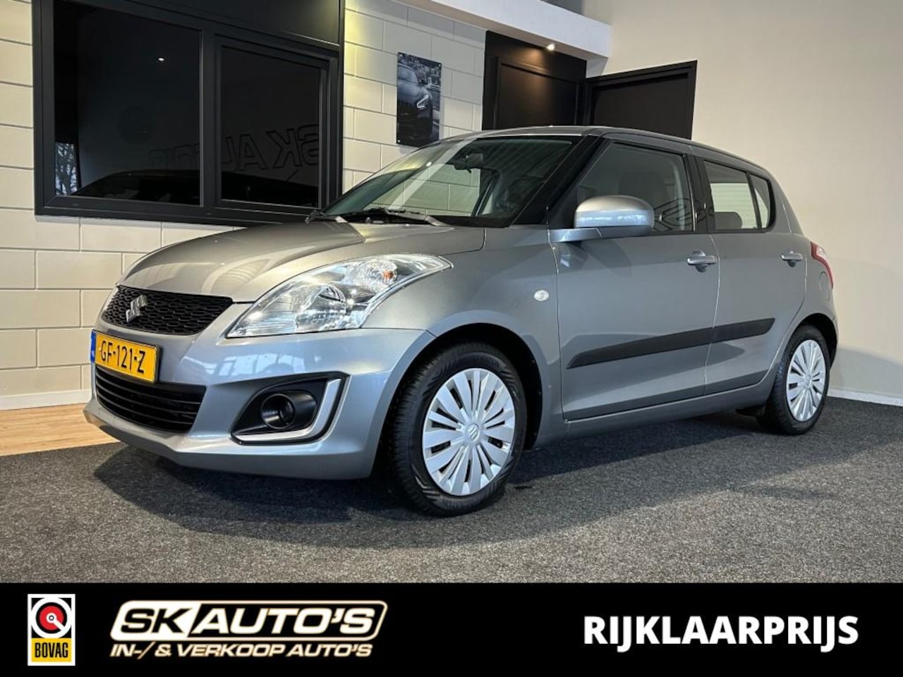 Suzuki Swift - 1.2 COMFORT EASSS l NAP l AIRCO l TREKHAAK l 5DRS l STOELVERW l - AutoWereld.nl