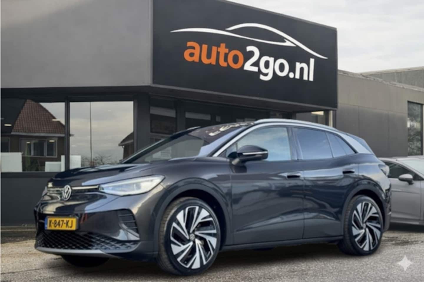 Volkswagen ID.4 - FIRST PRO MAX 77 KWH PANODAK DESIGNO-LEDER 21 INCH-LMV NAVI CAMERA APPLE-CARPLAY LED PDC - AutoWereld.nl