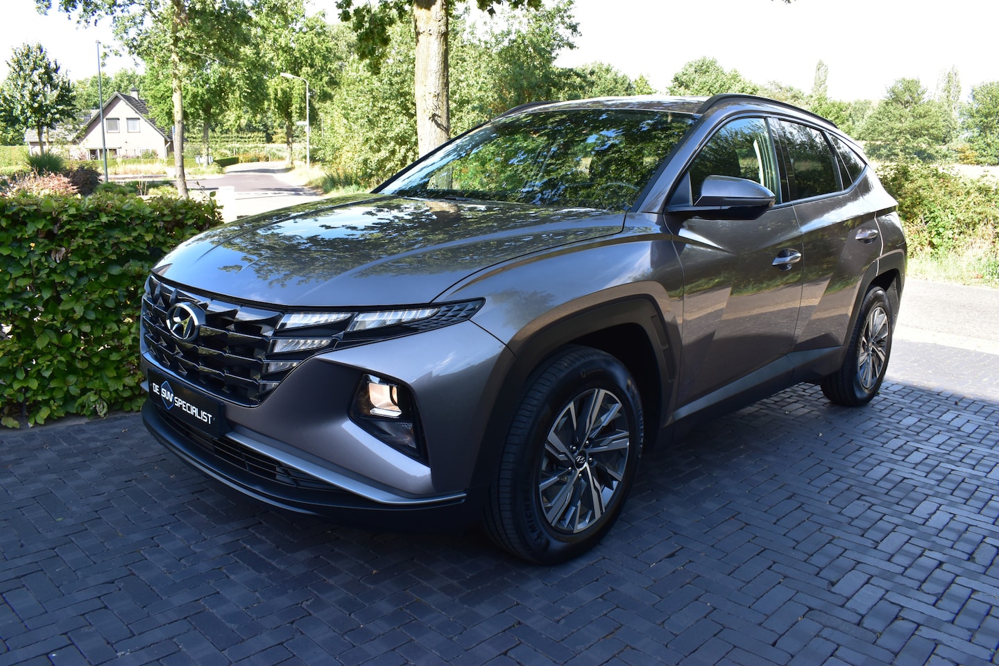 Hyundai Tucson - 1.6 T-GDI HEV Comfort 1.6 T-GDI HEV Comfort 180PK NIEUWSTAAT! - AutoWereld.nl