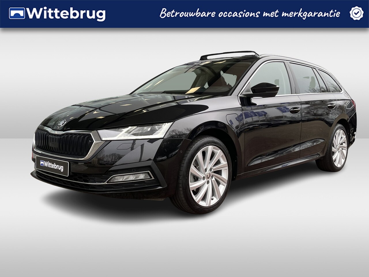 Skoda Octavia Combi - 1.4 TSI 204PK DSG iV PHEV Style / Panorama dak / Lederen bekleding / Led matrix / 18'' LMV - AutoWereld.nl