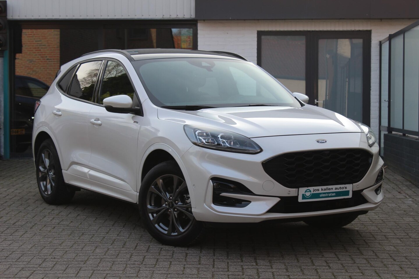 Ford Kuga - 2.5 PHEV ST-Line X Driver Ass Pack, Pearl White, Elek Trekhaak, Panoramadak, All Season! - AutoWereld.nl