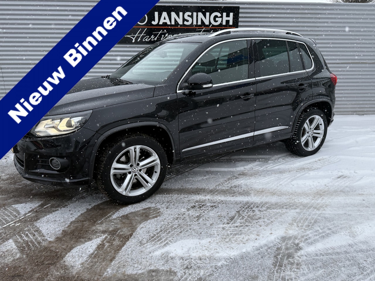 Volkswagen Tiguan - 1.4 TSI R-Line Edition met Schuif/Kanteldak | Lederen Bekleding | Stoelverwarming | PDC V+ - AutoWereld.nl