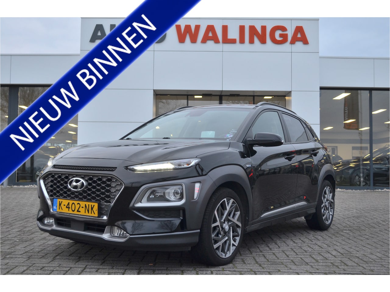 Hyundai Kona - 1.6 GDI HEV Premium stoelventi /Verwarm. | Head Up | Leer | Elek verst. Stoelen | Achterui - AutoWereld.nl