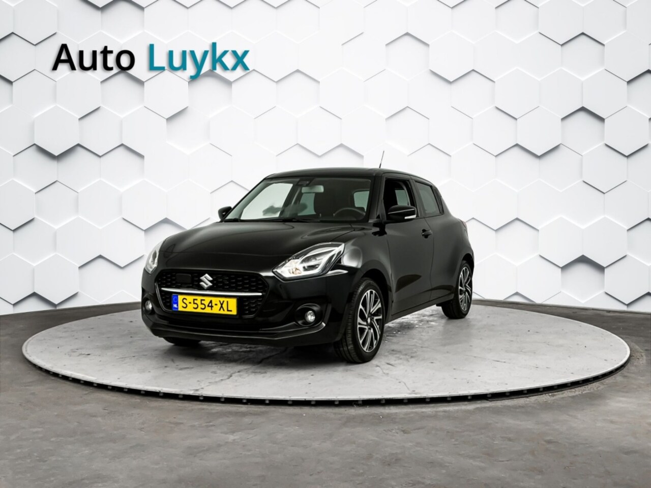 Suzuki Swift - 1.2 Style Smart Hybrid | Navigatie | Adaptieve Cruise Control | Trekhaak - AutoWereld.nl