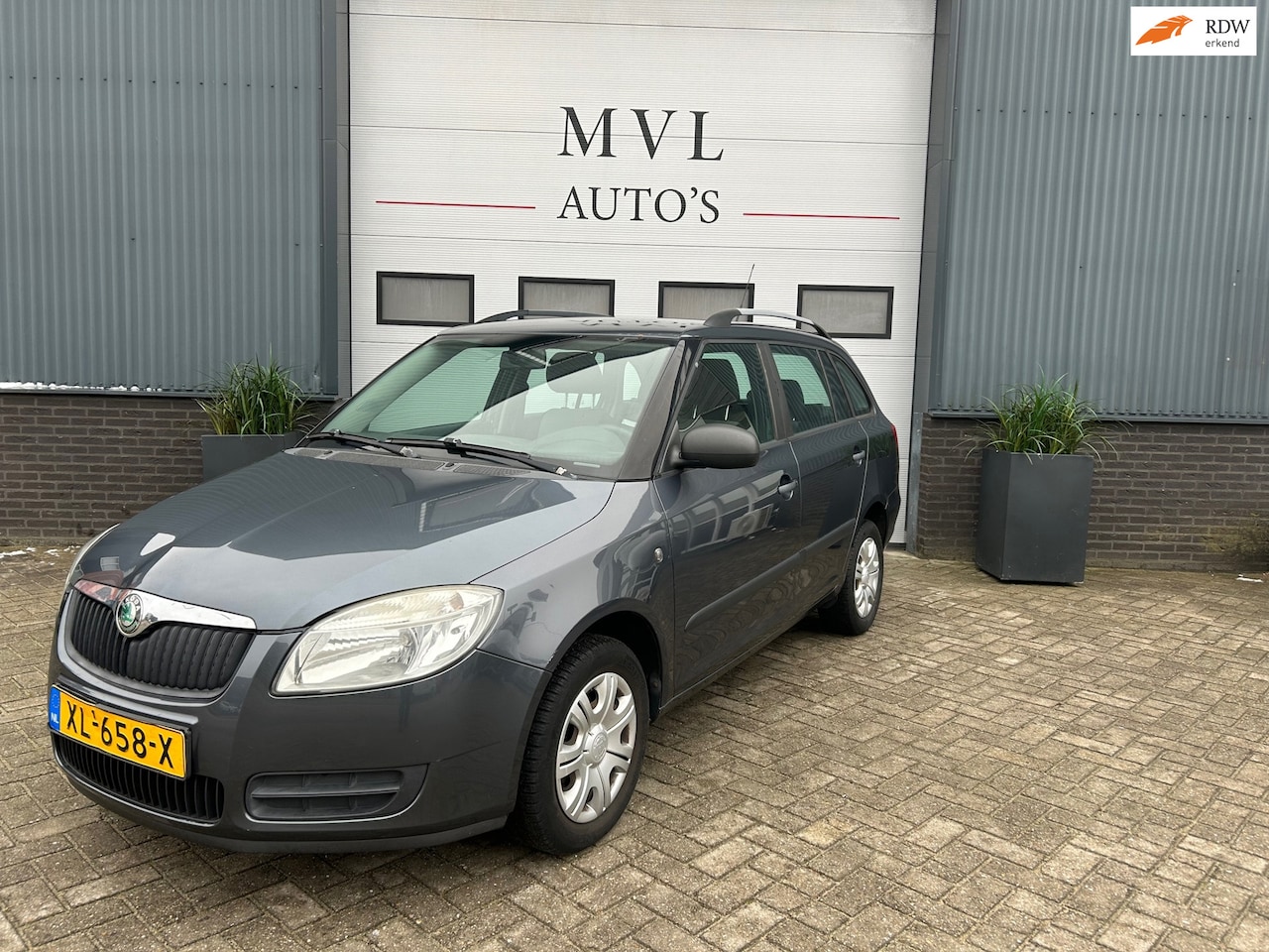 Skoda Fabia Combi - 1.2-12V Ambition Business Line / RIJKLAAR - AutoWereld.nl
