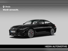 BMW i4 - M50 High Executive 84 kWh | M-sport Pro. | M-remsportschijven | Achteruitrijcamera | Stoel