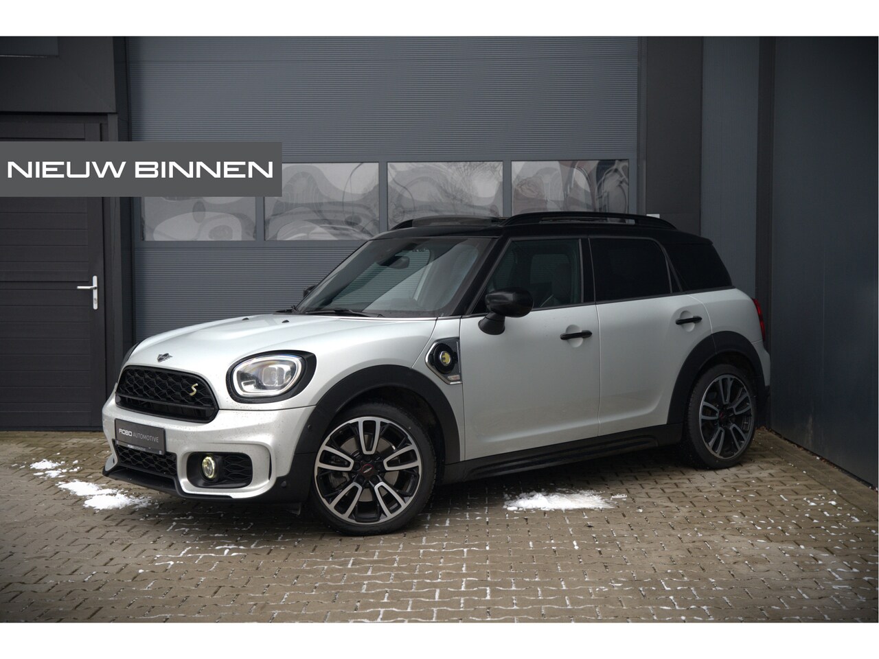 MINI Countryman - Mini 1.5 Cooper S E ALL4 | JCW | Panoramadak | Stoelverwarming | Harman Kardon | Head-Up D - AutoWereld.nl