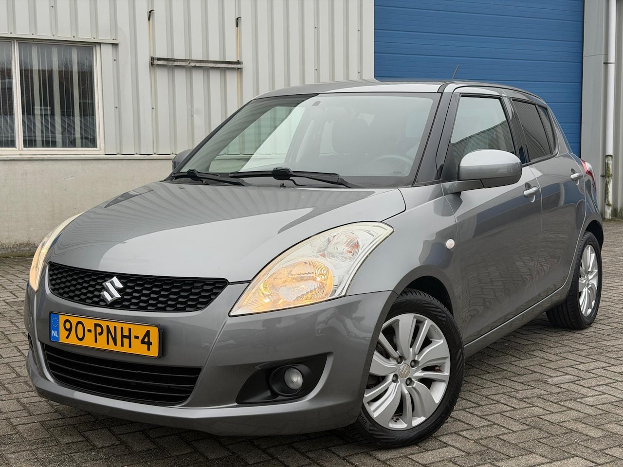 Suzuki Swift - 1.2 Exclusive/Automaat/Airco/Cruise/Camera/LMV/NAP - AutoWereld.nl