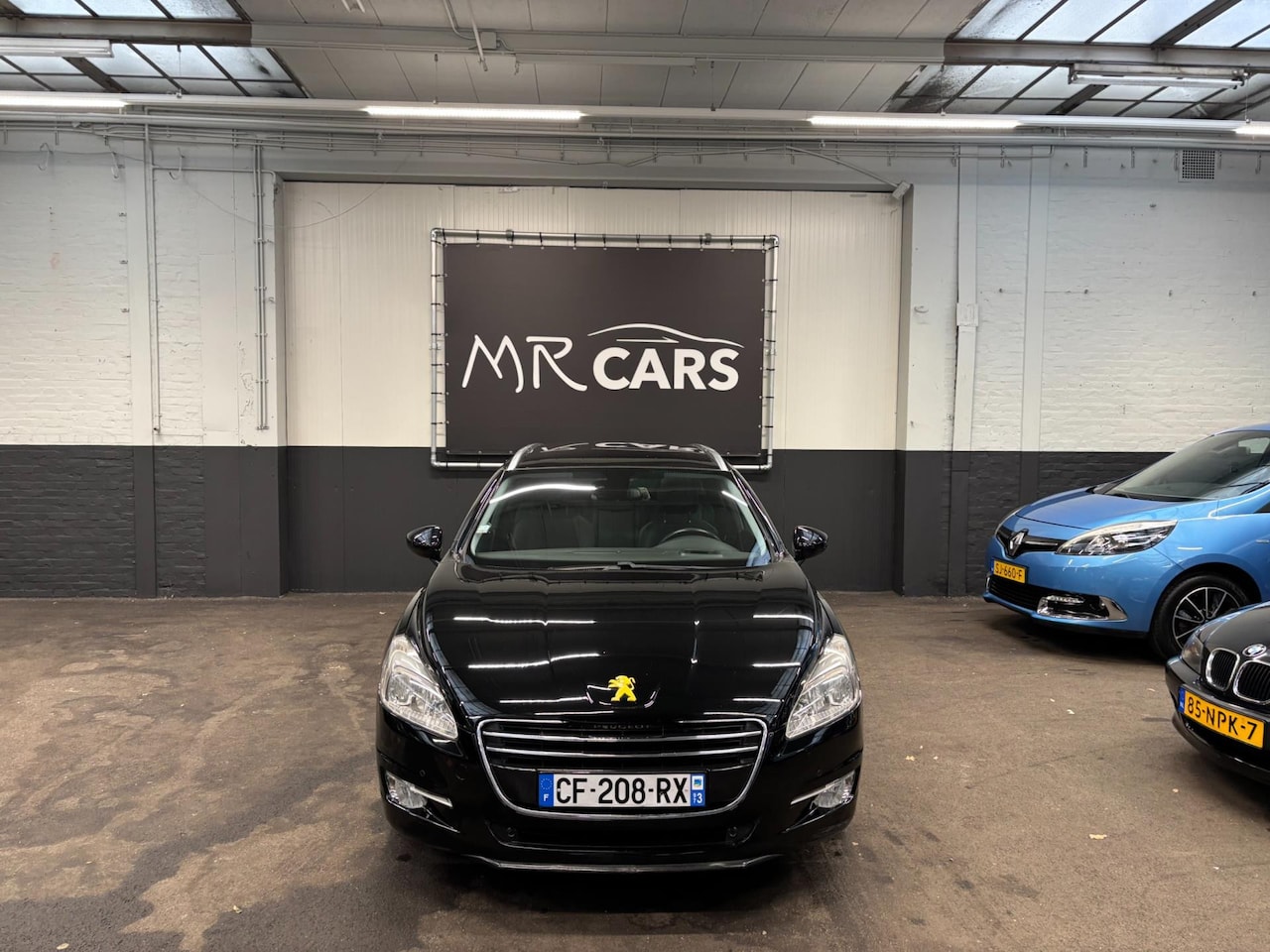 Peugeot 308 SW - 1.6 e-HDi Blue Lease Executive pano/clima/leder - AutoWereld.nl