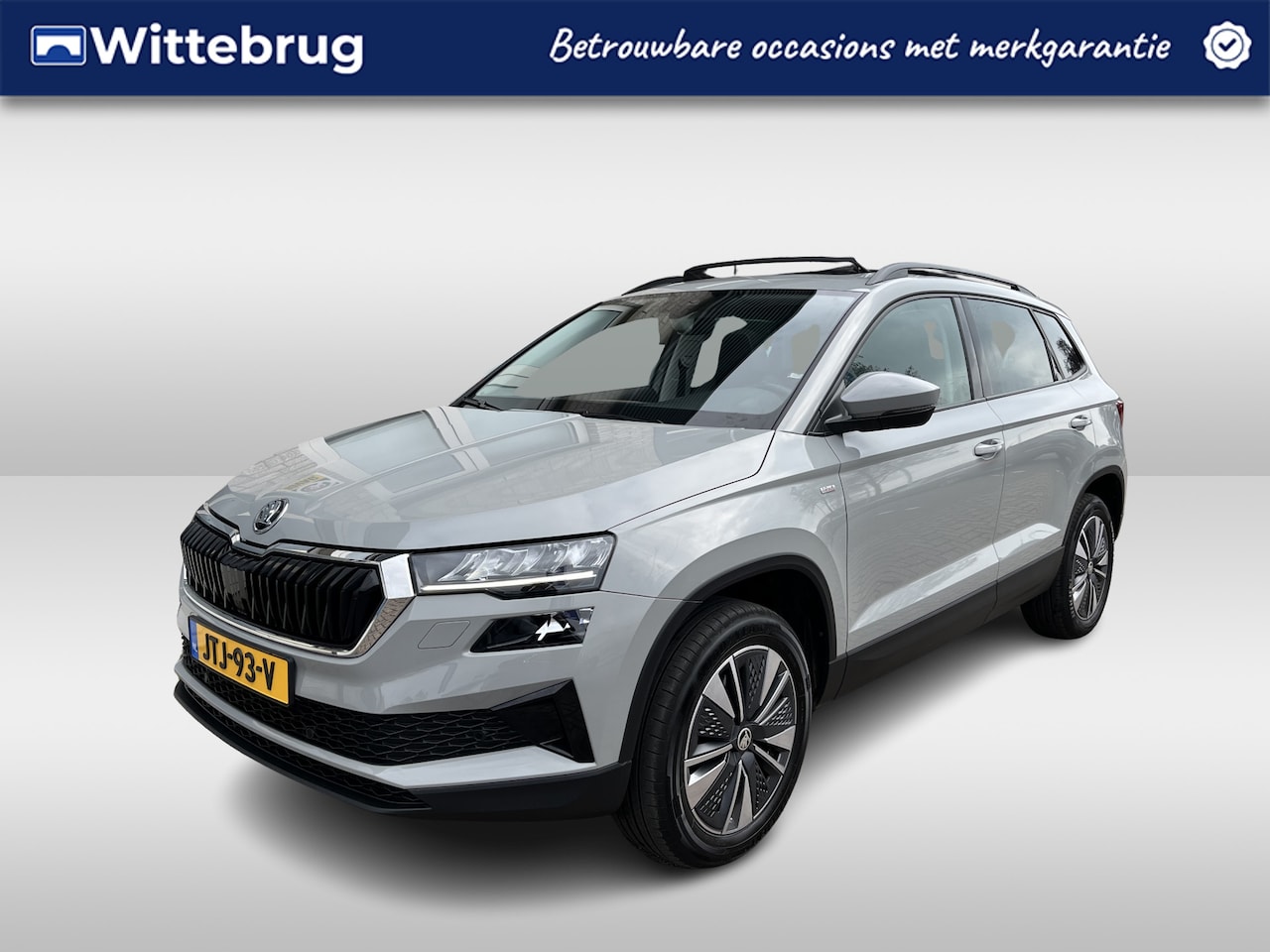 Skoda Karoq - 1.0 TSI Ambition / PANO/ STUUR+STOEL VERWARMING/ PARK.SENSOREN V+A/ CAMERA/ ACC/ SMARTLINK - AutoWereld.nl