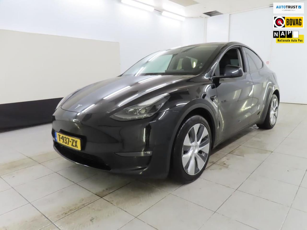 Tesla Model Y - Long Range AWD 75 kWh WARMTEPOMP TREKHAAK SOH 91% - AutoWereld.nl