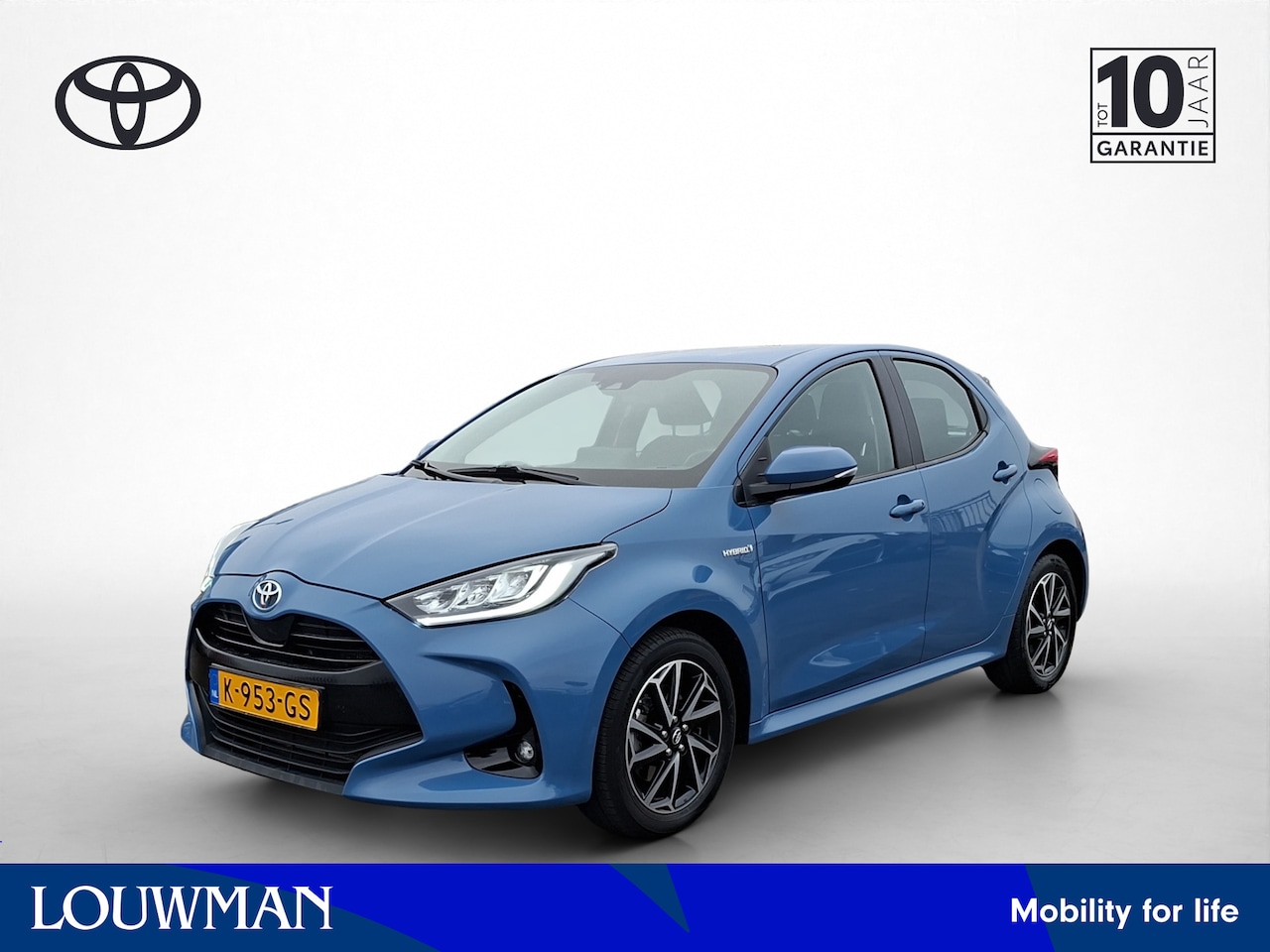 Toyota Yaris - 1.5 Hybrid First Edition Mats foto's maken. staat boven in showroom - AutoWereld.nl