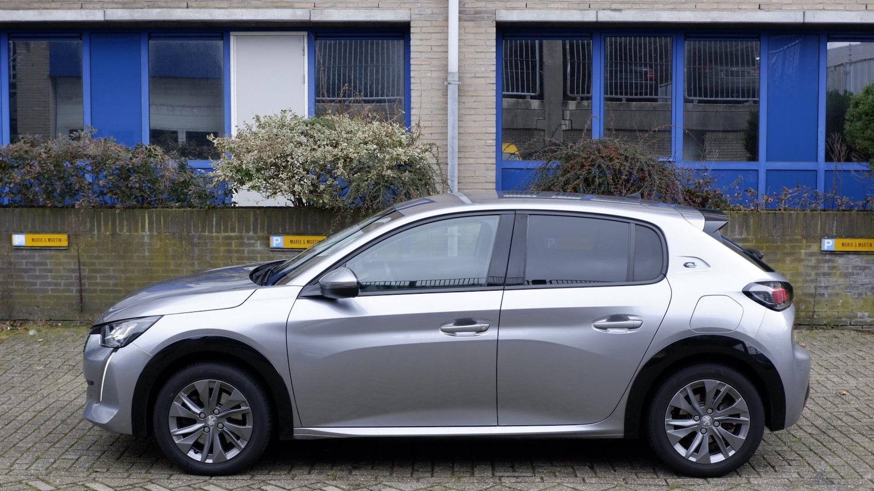 Peugeot e-208 - EV Blue Lease Allure 50 kWh - AutoWereld.nl