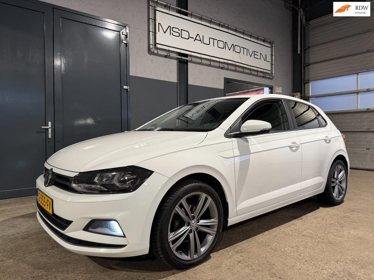 Volkswagen Polo - 1.0 MPI Comfortline Business Sportvelgen Privacy Glass - AutoWereld.nl