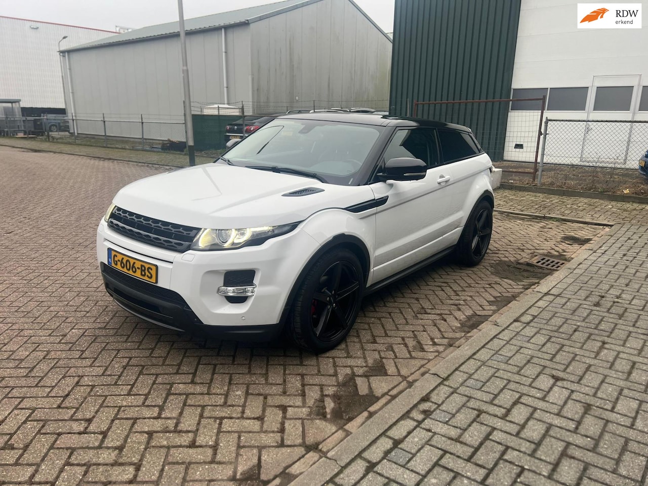 Land Rover Range Rover Evoque Coupé - 2.0 Si 4WD Prestige Navi Leer Cruise Airco Automaat - AutoWereld.nl