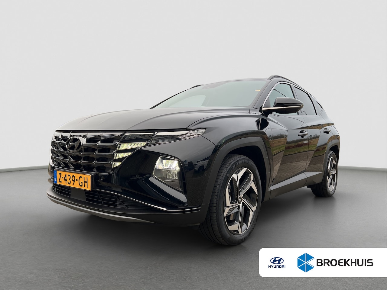 Hyundai Tucson - 1.6 T-GDI PHEV Premium 4WD | Leder | Carplay | Climate | Keyless | Navigatie | Elek. Klep - AutoWereld.nl