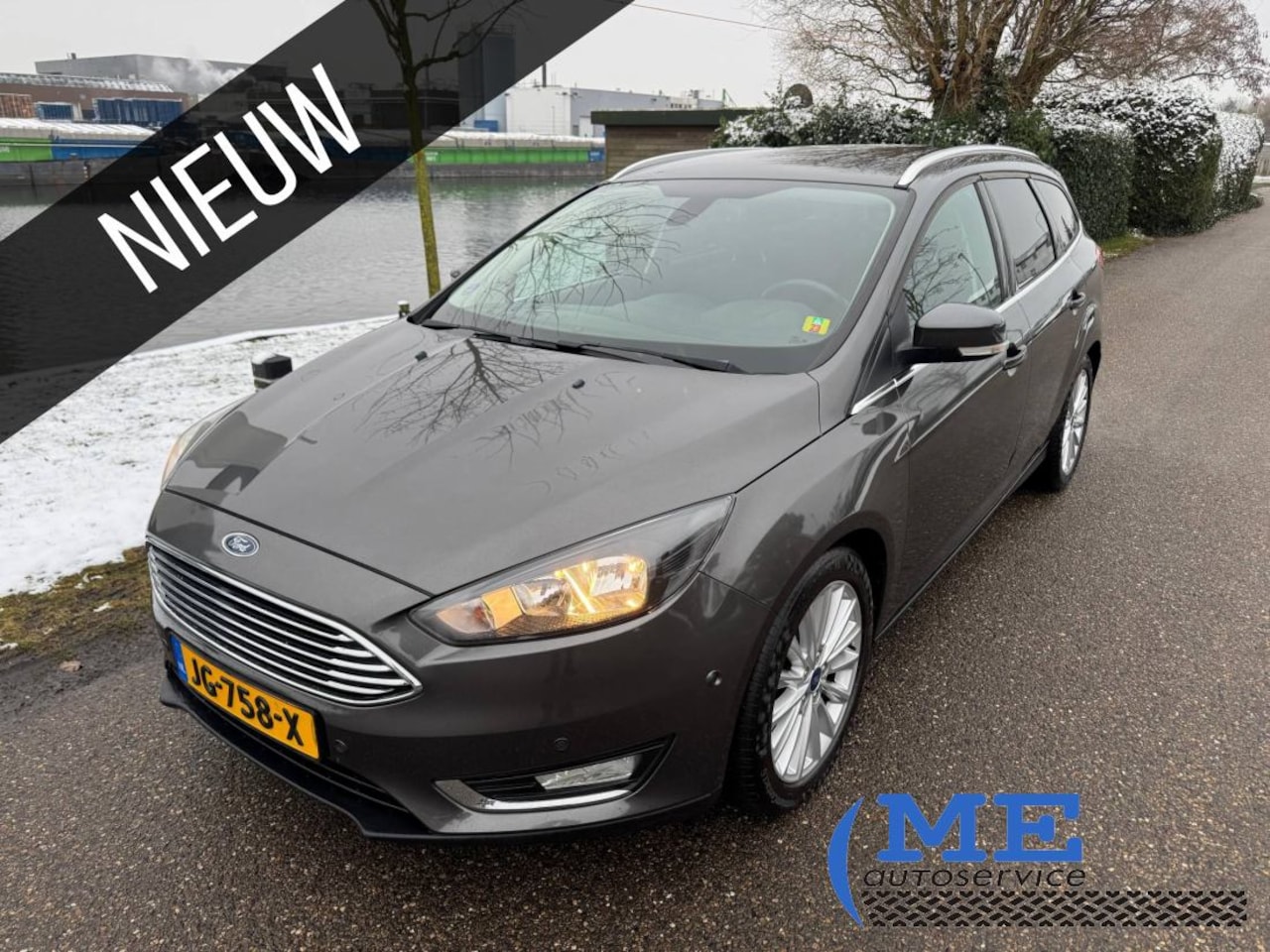 Ford Focus Wagon - 1.0 Titanium|PDC|Trekhaak| - AutoWereld.nl